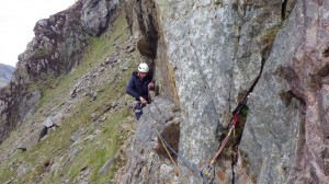 Chris starting the traverse on the first pitch of the Wrinkle
